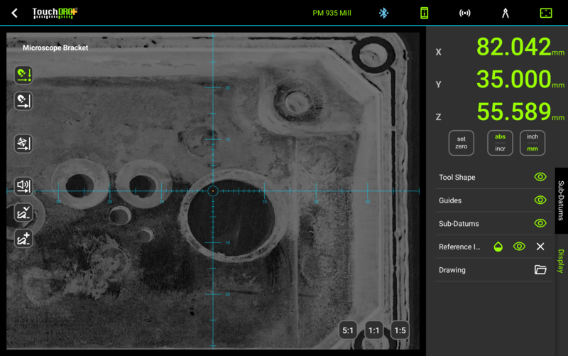 Fig. 1: A photo of the part as the background of the graphical view, aligned to the machine coordinates TouchDRO graphical view with a photo of an enclosure as the background, aligned to the machine coordinates