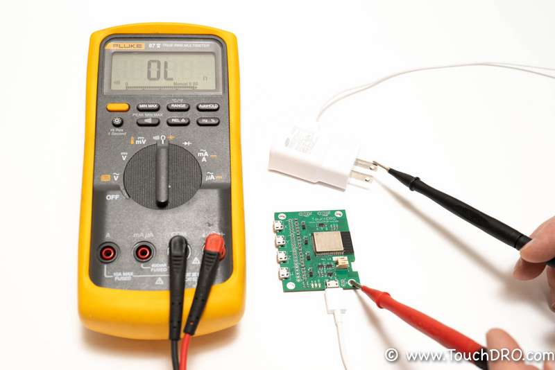 Using a multimeter to check for connectivity between AC prongs and boards ground